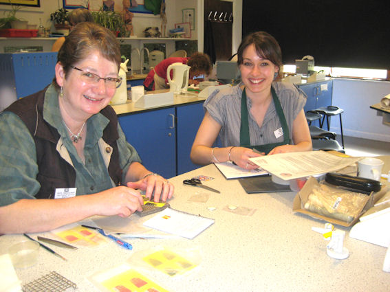 Joy Funnell, Treasurer and Stacey Bentley, Bursary Winner 2009, working with transfers in Jane Moore's workshop, York Conference 2009